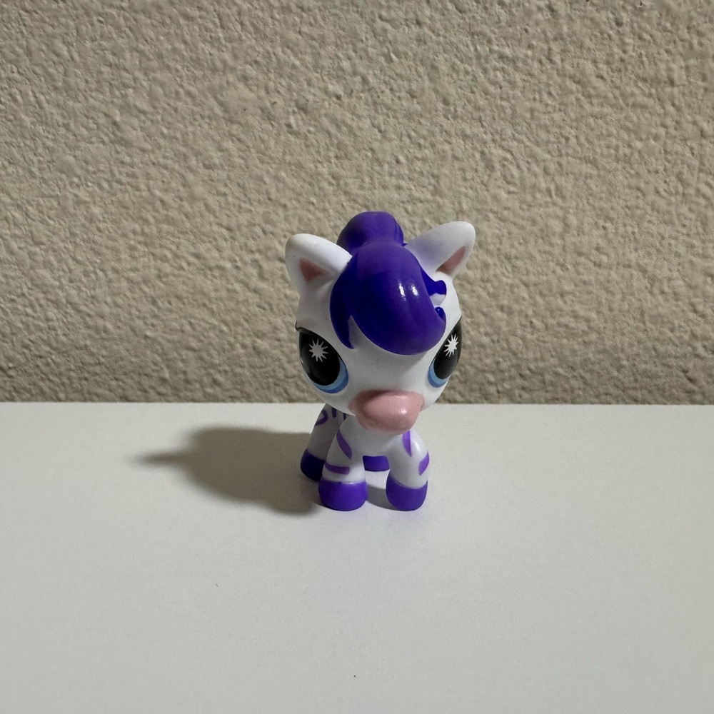 Littlest Pet Shop Series 4 G7 Zebra # 249
New out of box. - Picture 2 of 5